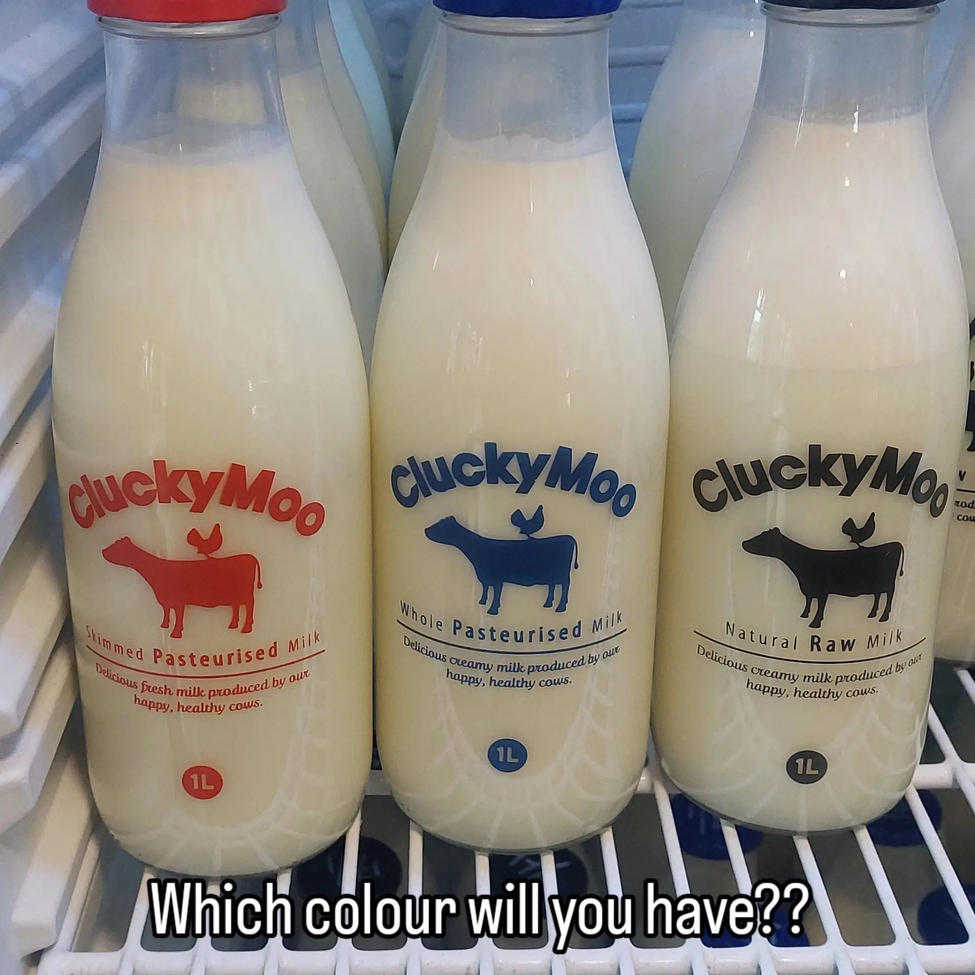 CluckyMoo bottles of skimmed, whole and raw milk